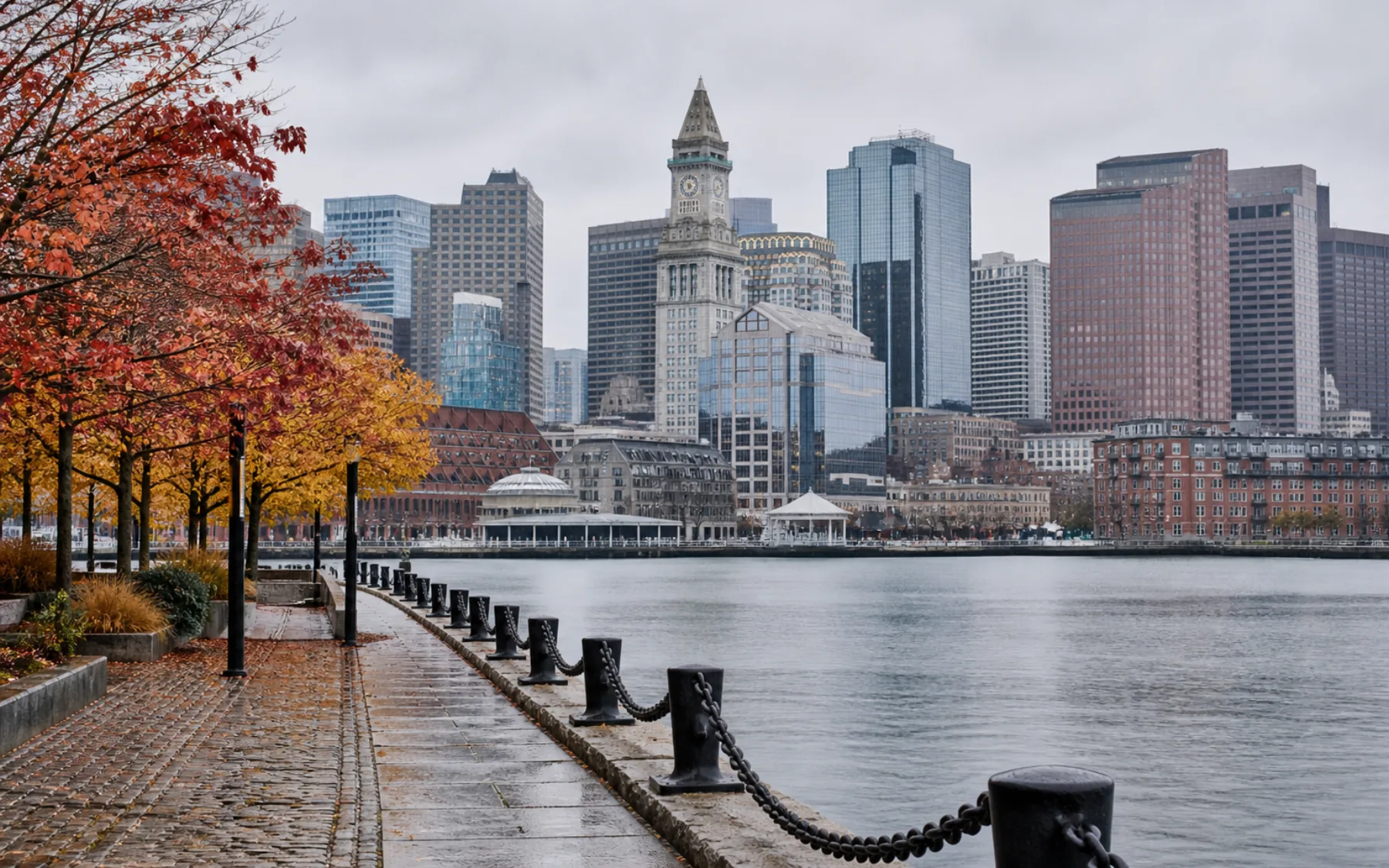 Boston waterfront and Custom House Tower framed by late-autumn foliage
